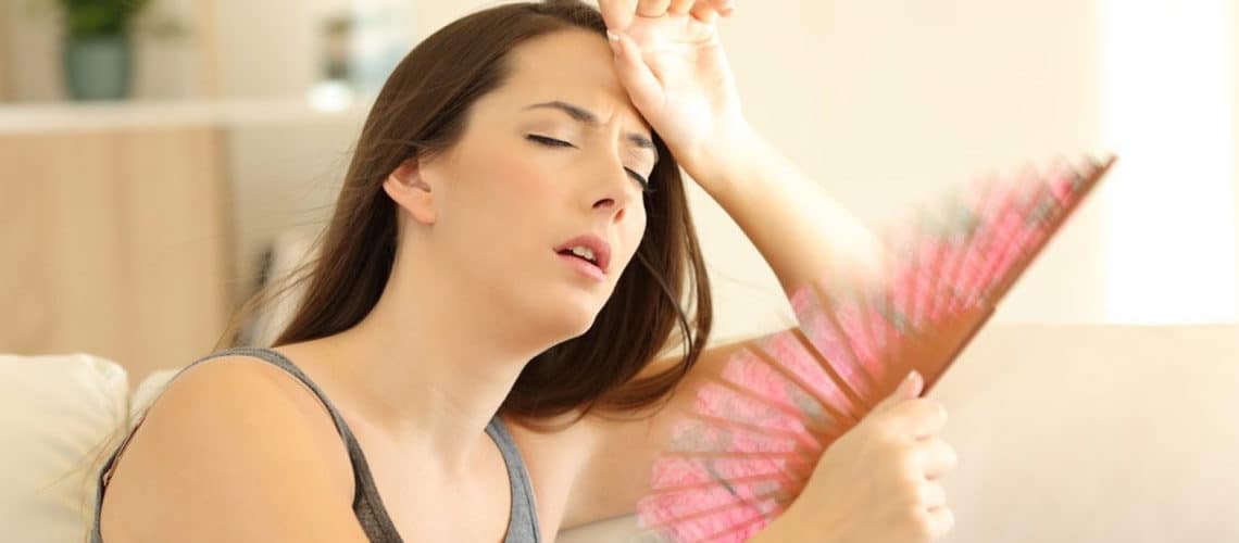 woman hot from broken A/C