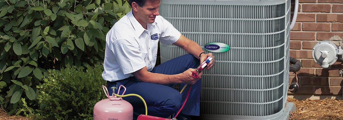 a/c repair man filling up unit